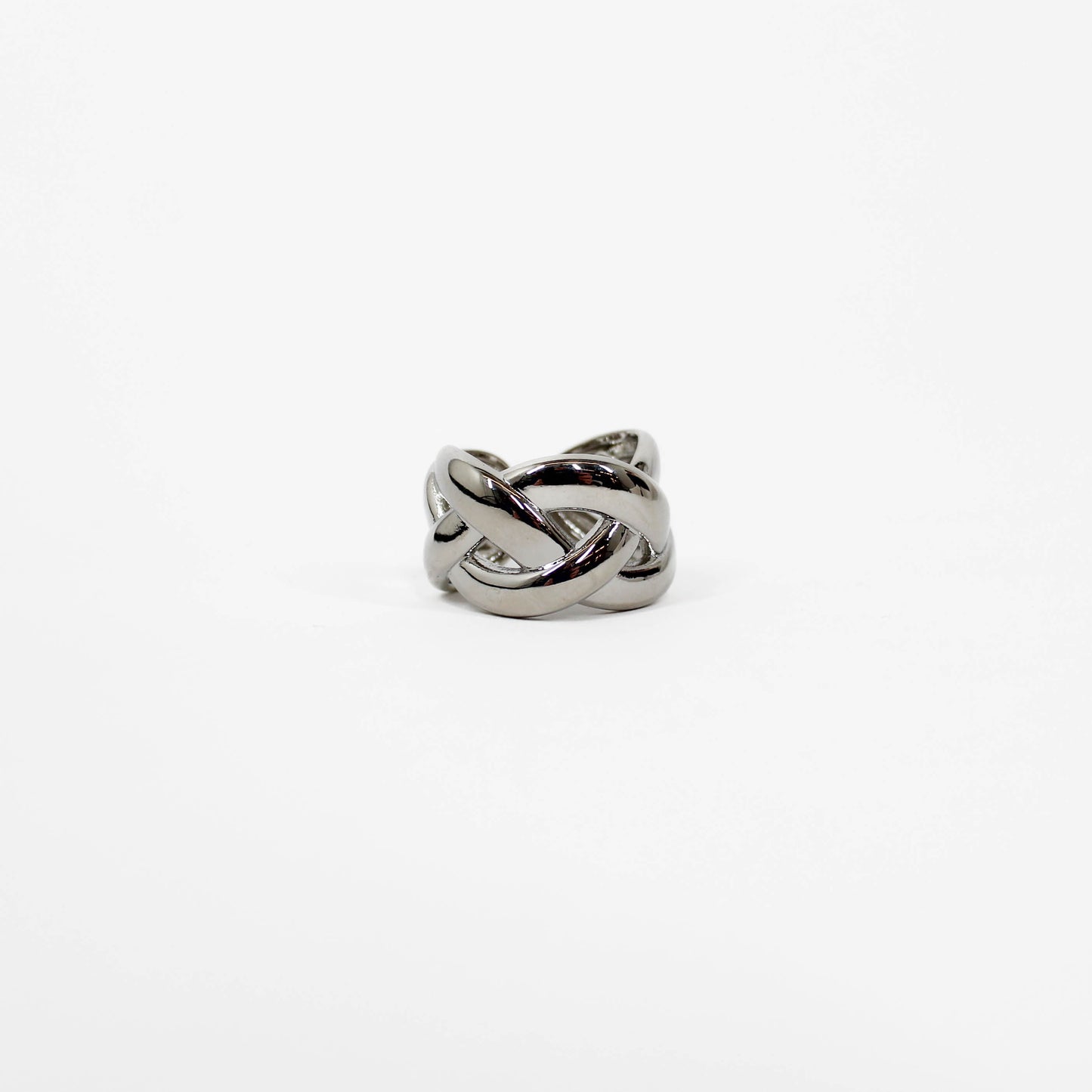 Braided band Silver ring with a knot design on a white background