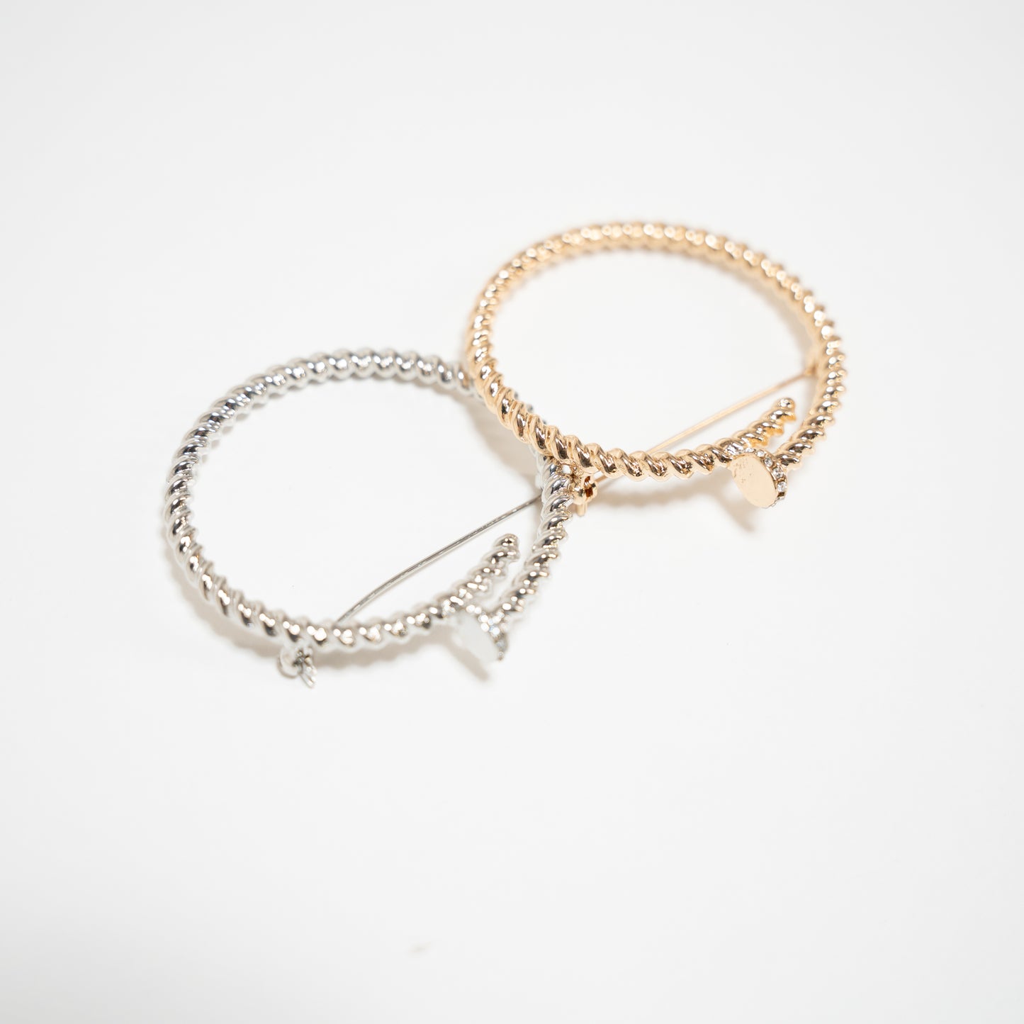 Circle nail brooch gold and silver