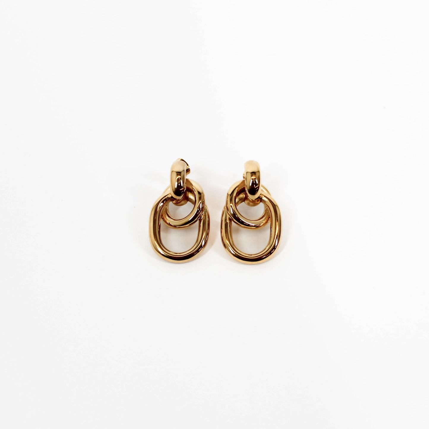 Double link drop earrings on a white background