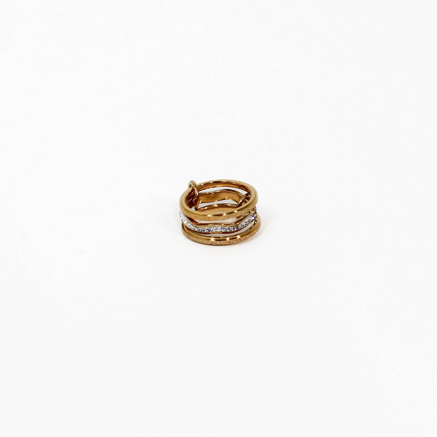Gold and silver interlocking link ring crystal with embedded stones on a white background