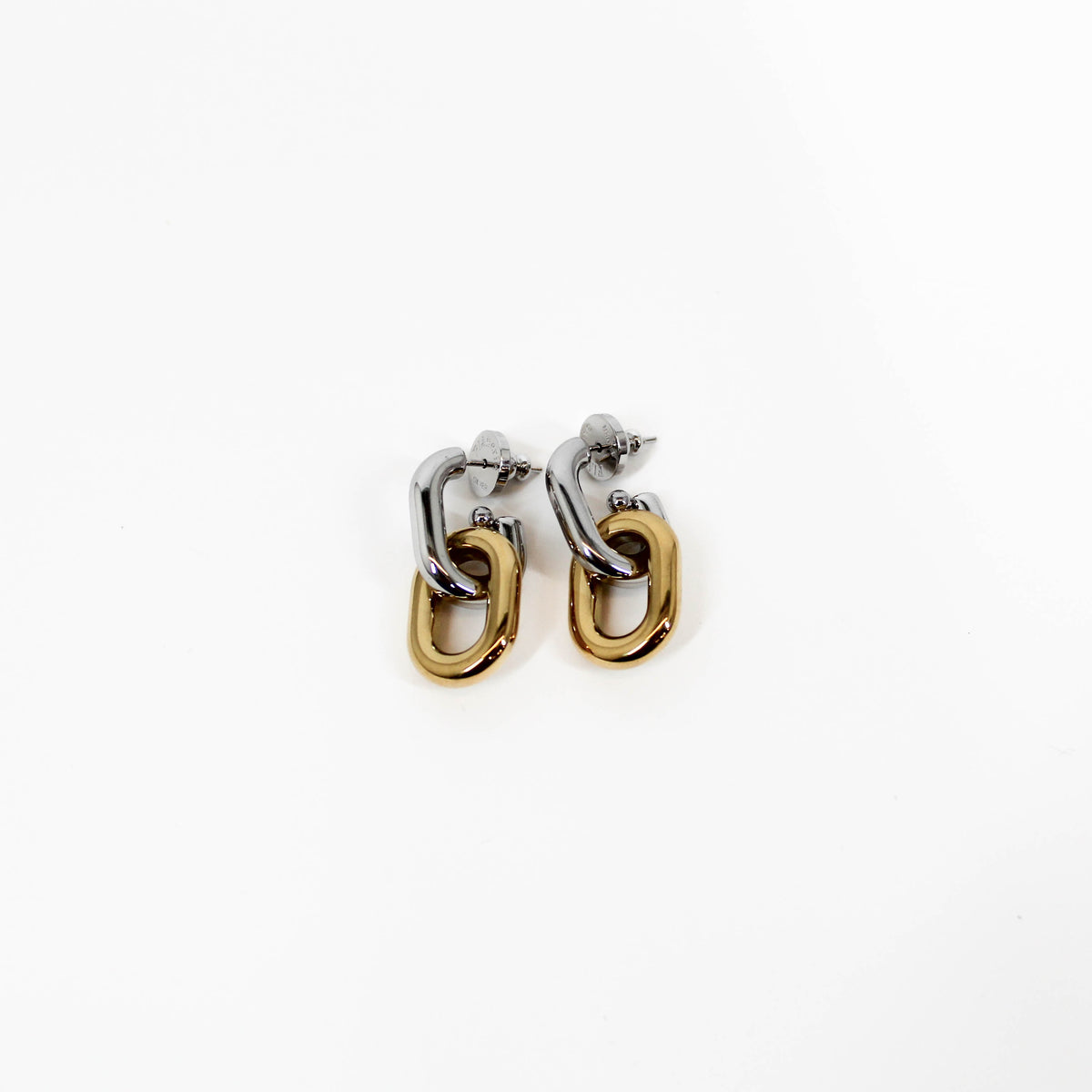 Pair of silver and gold mixed metal chain drop earrings on a white background