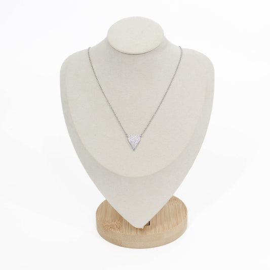 Silver pave heart crystal necklace on a white mannequin bust