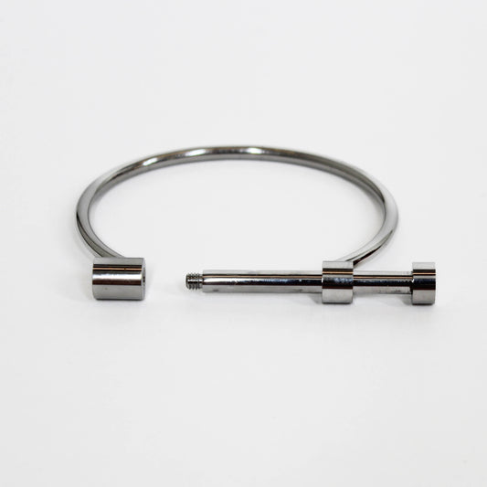 Silver screw cuff bracelet bangle unscrewed on a white background