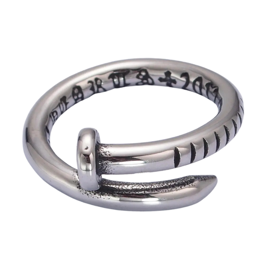 close up photo of silver stainless steel bended nail ring