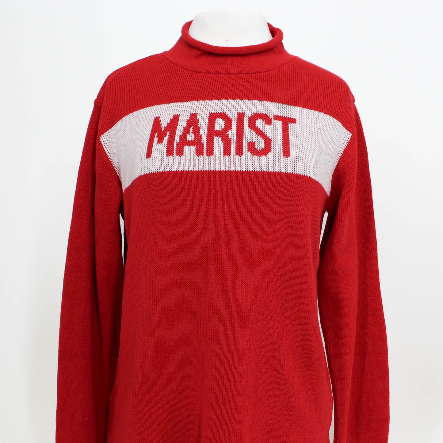 Red sweater with 'MARIST' text on a white background