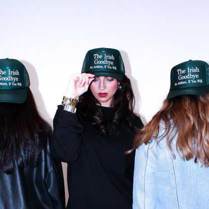  "The Irish Goodbye. An Artform, If You Will" on a dark green trucker hat.&nbsp;