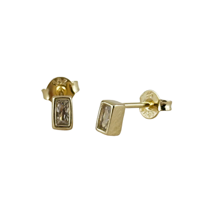 Gold baguette stud earrings with gemstones on a white background
