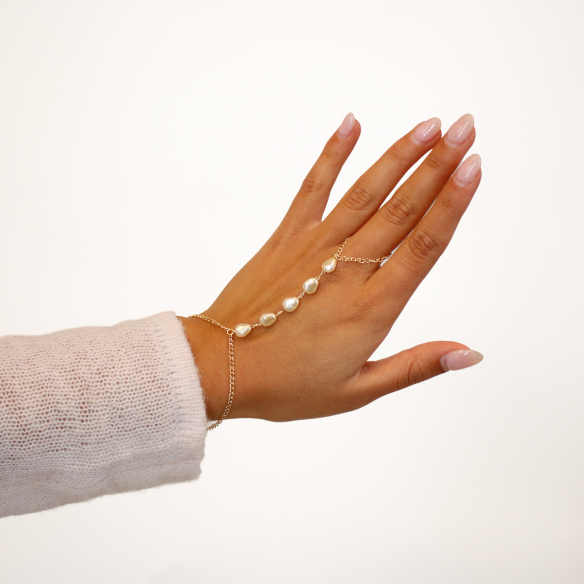 pearl hand chain on model