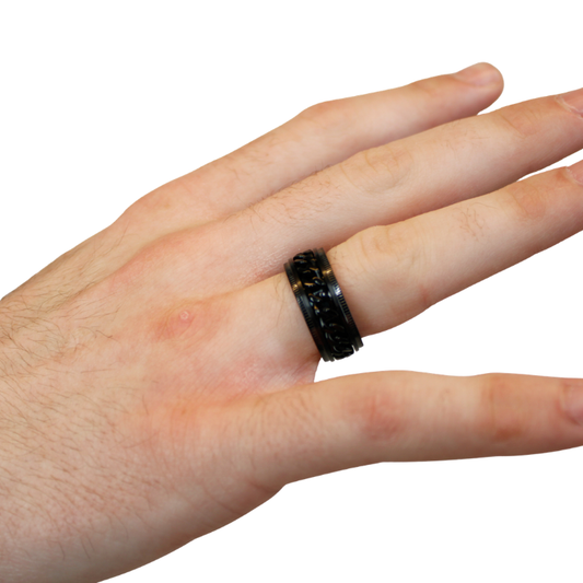 Black Stainless Steel Chain Spinner Ring on hand  model with white background