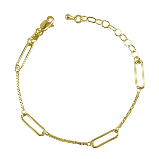 Gold chain link bracelet with a clasp on a white background