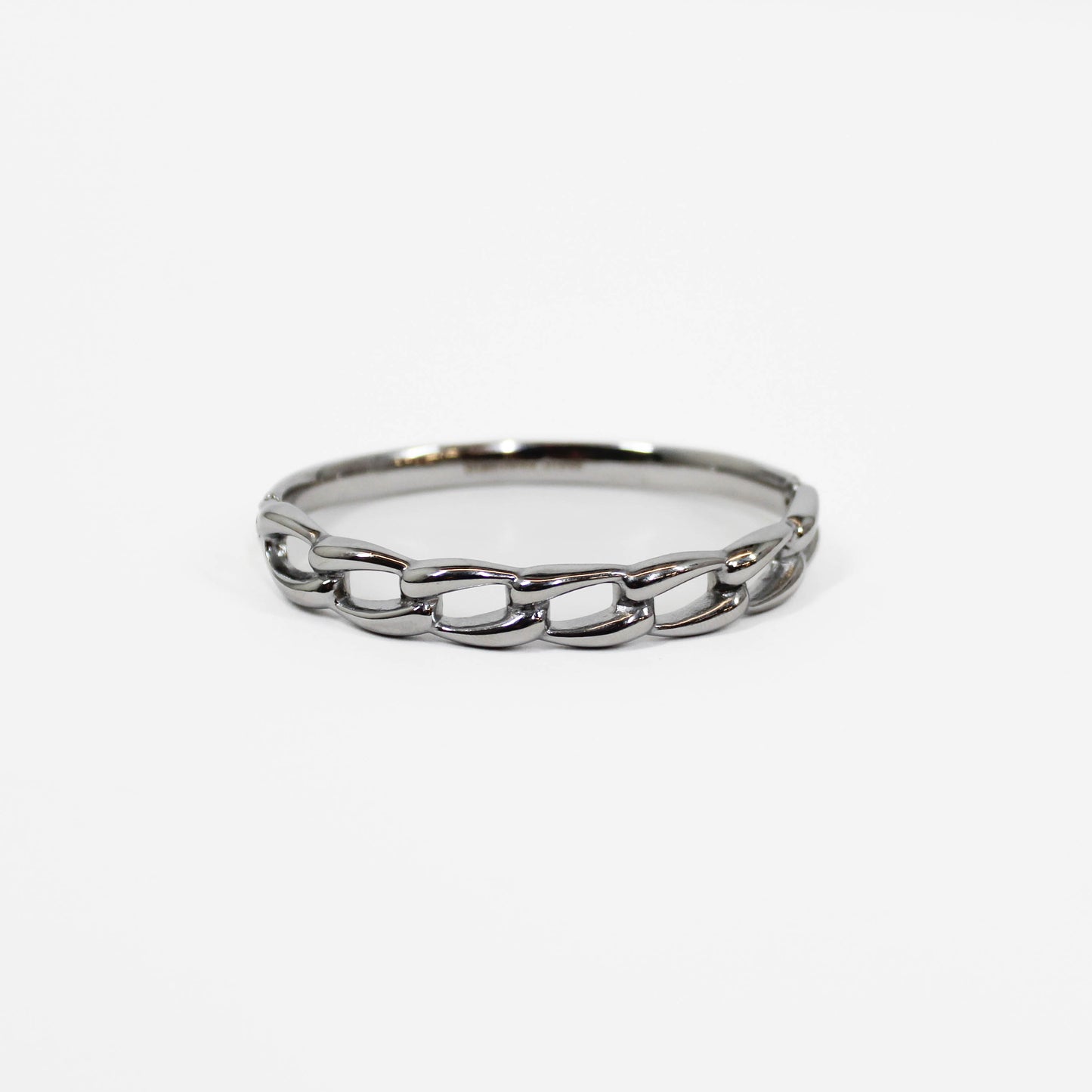 Silver chain-link hinged bangle bracelet on a white background