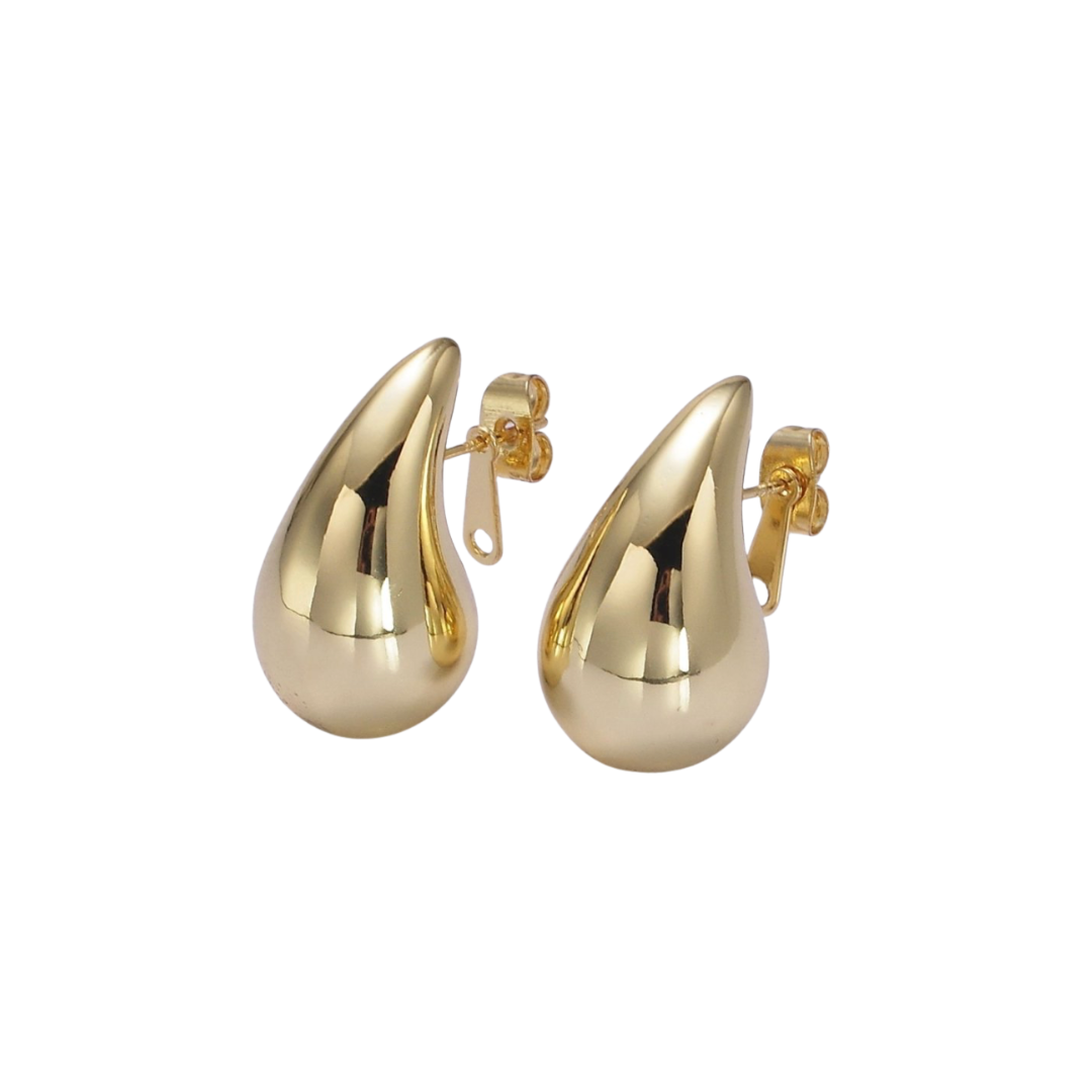 Gold chunky teardrop earrings on a white background