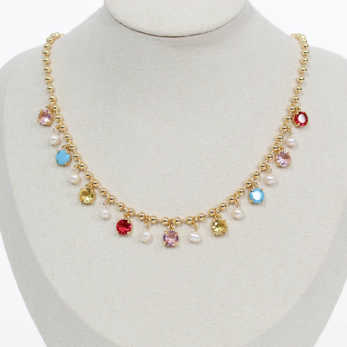 Necklace with colorful beads on a mannequin