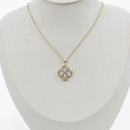 Crystal Clover Necklace on a mannequin with a white background 