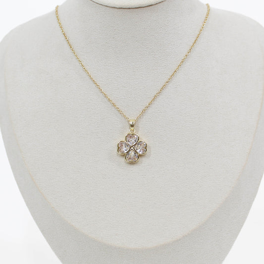 Crystal Clover Necklace on a mannequin with a white background 