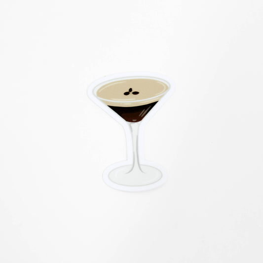 Cocktail in a martini glass with a white background