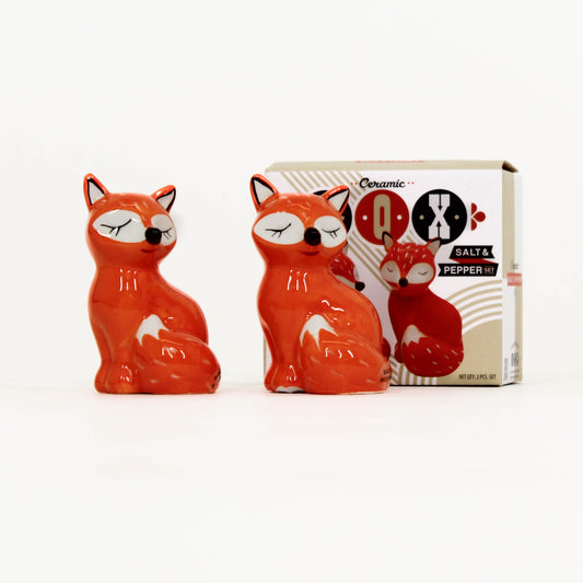 Ceramic fox salt and pepper shakers with packaging on a white background