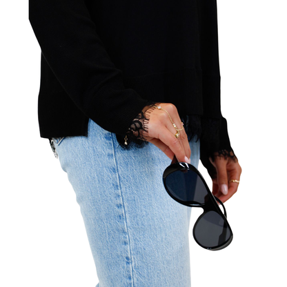 Holding Aviator Sunglasses