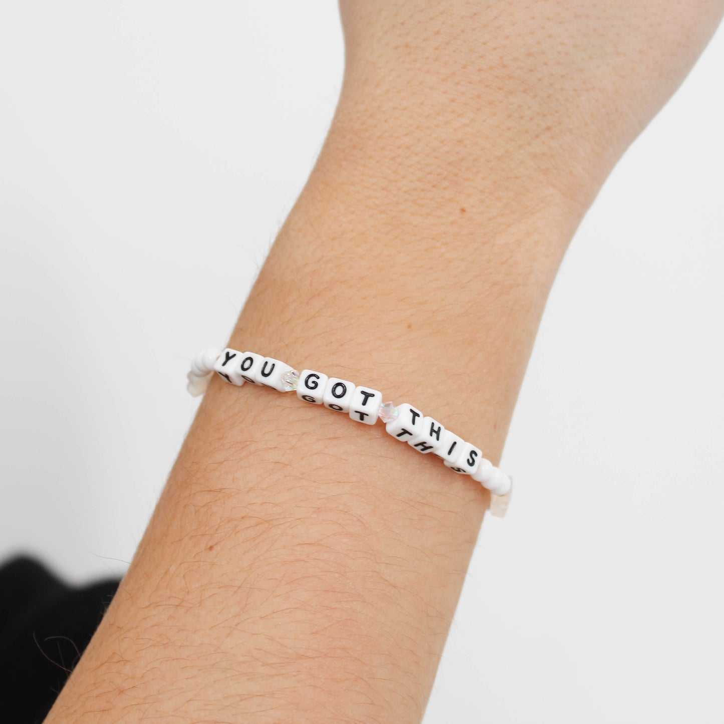 Little Words Project Bracelet with 'YOU GOT THIS' message on wrist against a neutral background