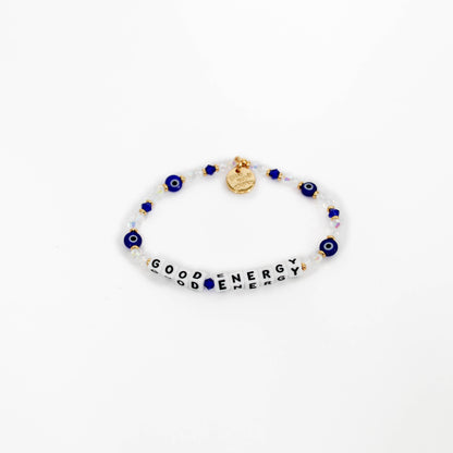 Little Words Project Bracelet with blue evil eye beads and 'Good Energy' text on a white background