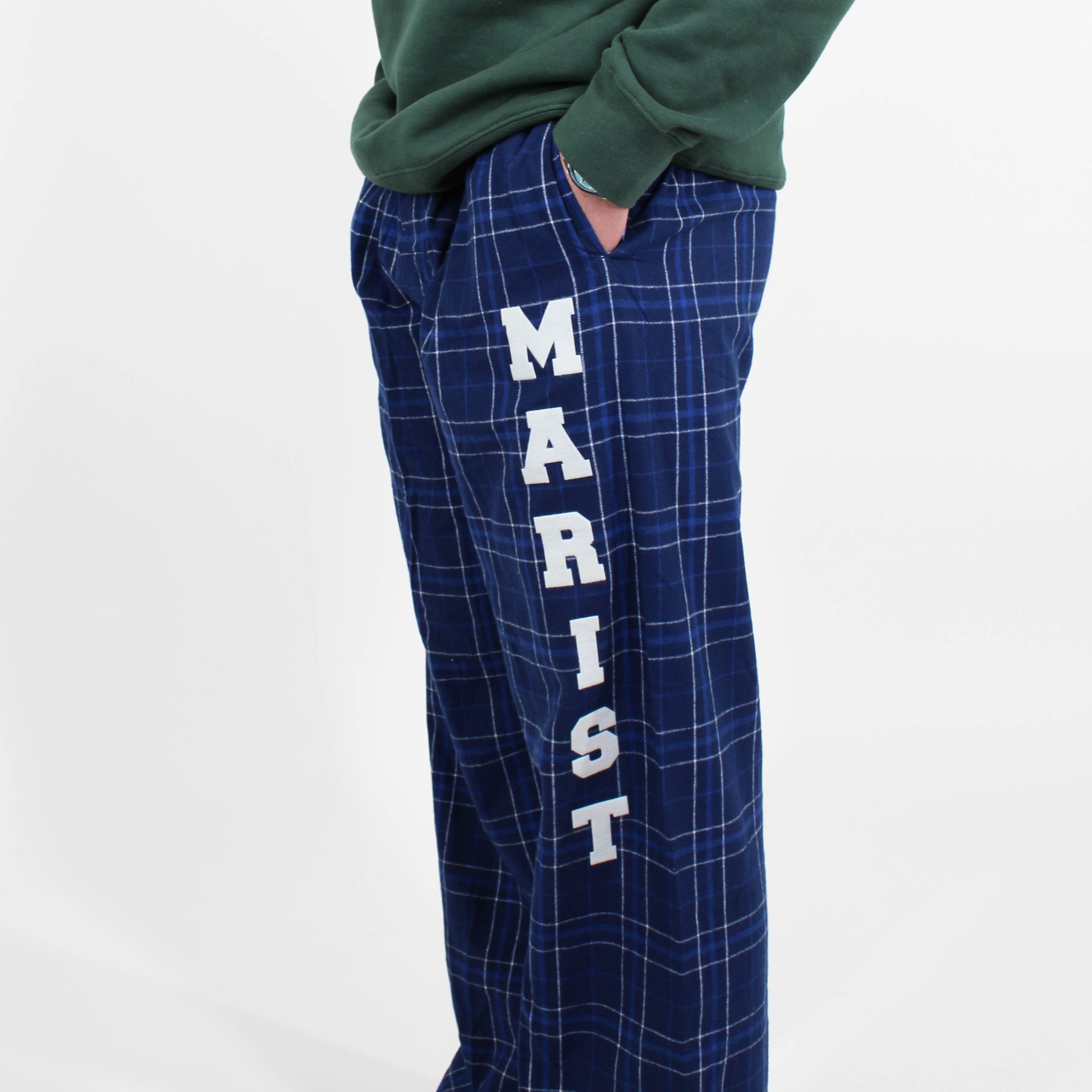 Blue plaid pants with 'MARIST' text on a white background
