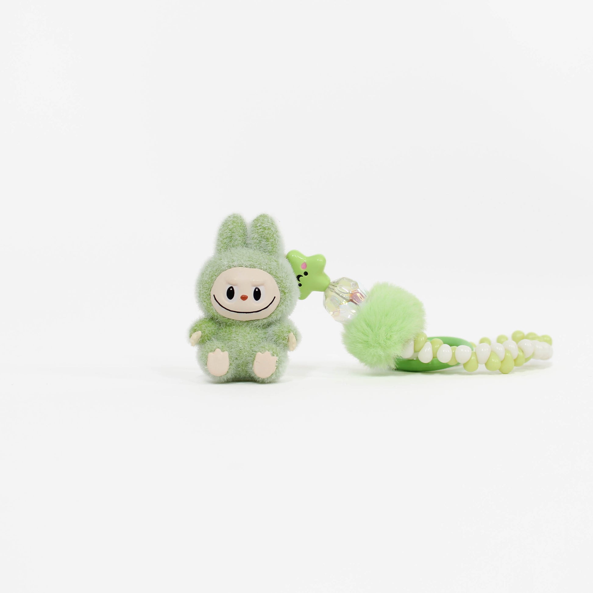 green labubu keychain