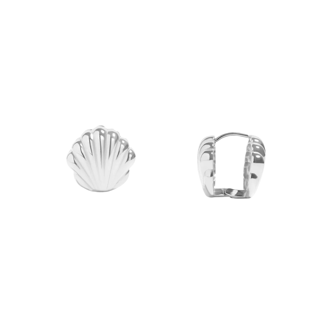 Silver shell-shaped earrings on a white background
