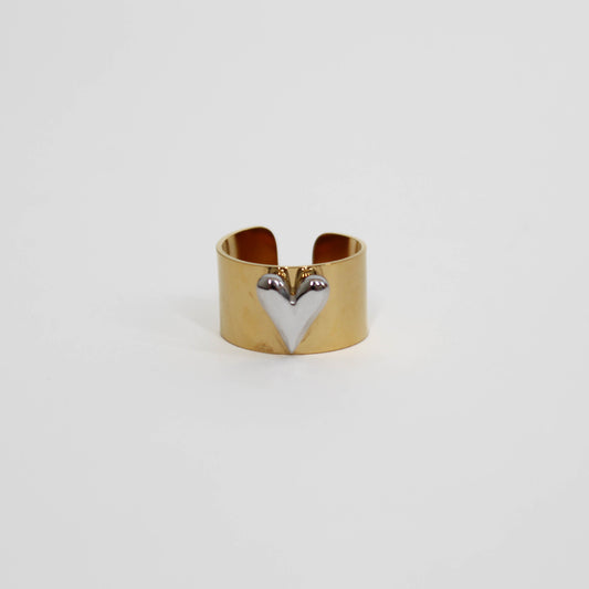 Gold mixed metal heart ring with a heart-shaped design on a white background