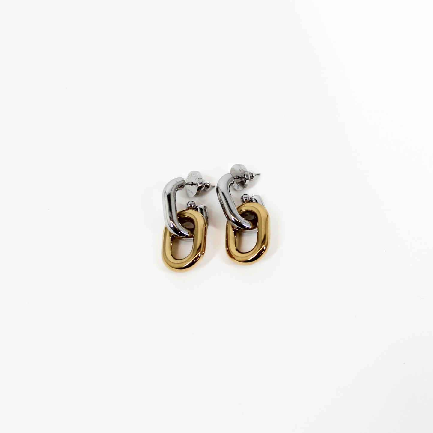 Pair of silver and gold mixed metal chain drop earrings on a white background