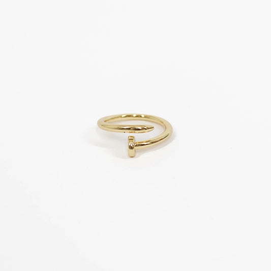 gold nail ring on a white background 