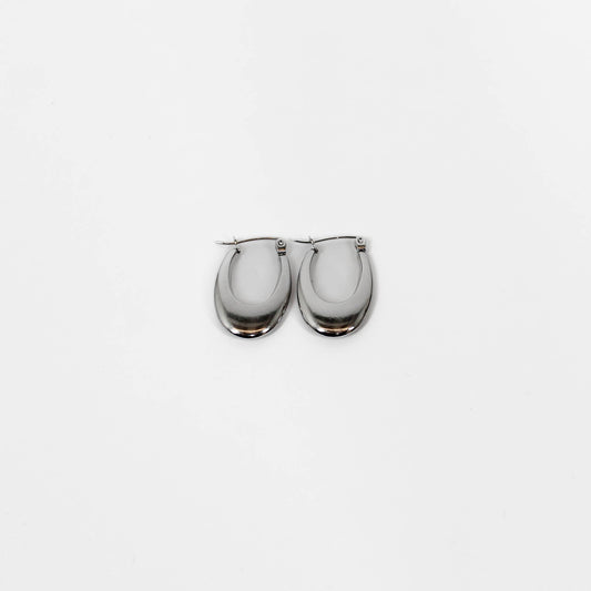 Pair of silver oblong latch hoop earrings on a white background