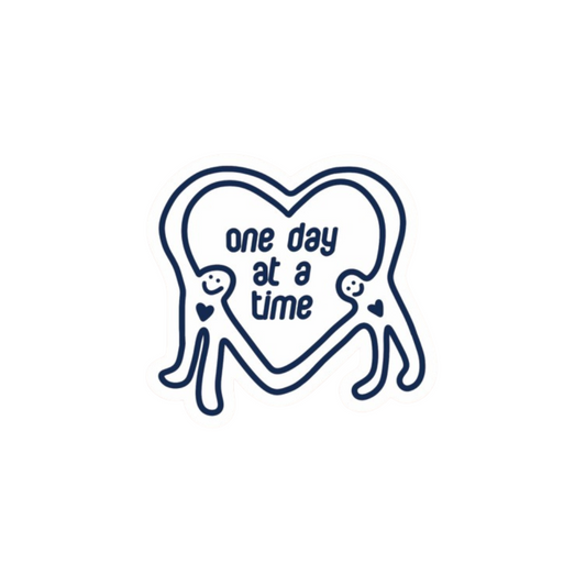 Heart-shaped bubble with 'one day at a time' 