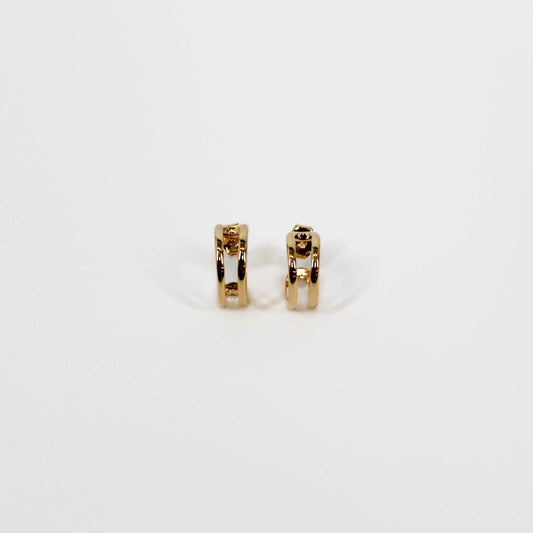 Gold open mini hoop earrings on a white background