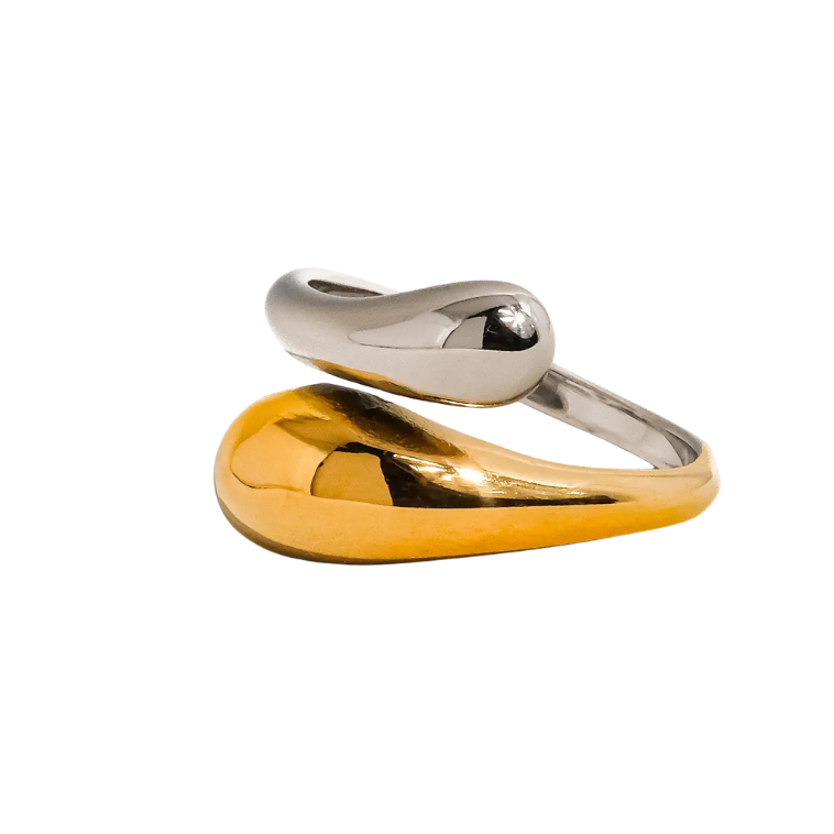 gold and silver twist ring on white background