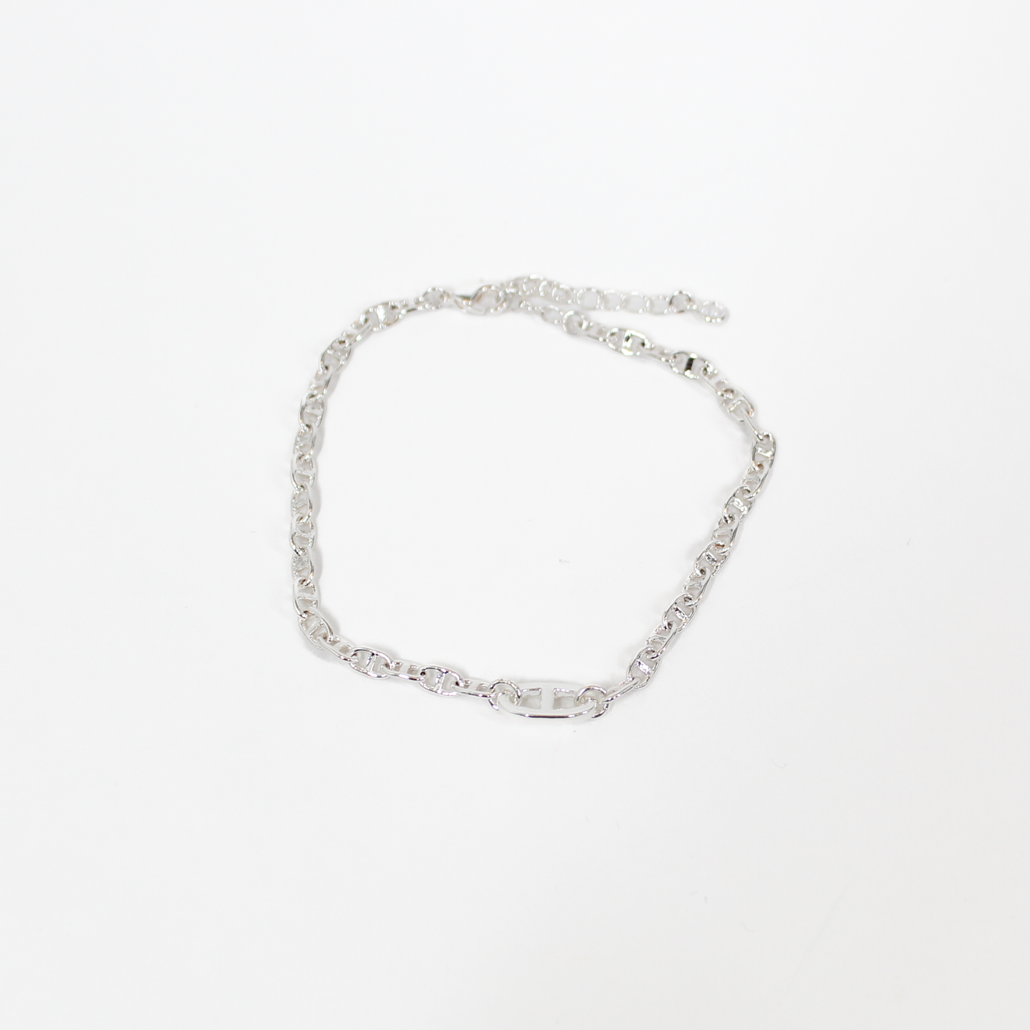 Silver oval link chain bracelet on a white background
