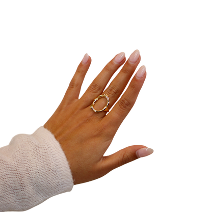 o shaped ring on hand model with white background