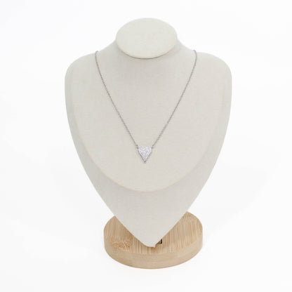 Silver pave heart crystal necklace on a white mannequin bust