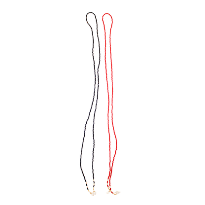 Red and black wrap bead necklaces laying next to each other 