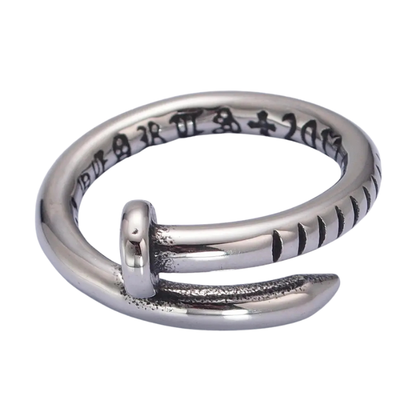 close up photo of silver stainless steel bended nail ring
