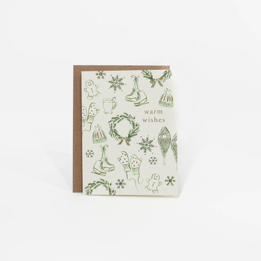 Greeting card with winter-themed illustrations on a white background