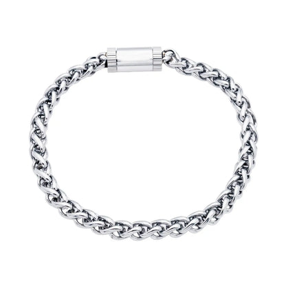 close up of silver chain bracelet on white background