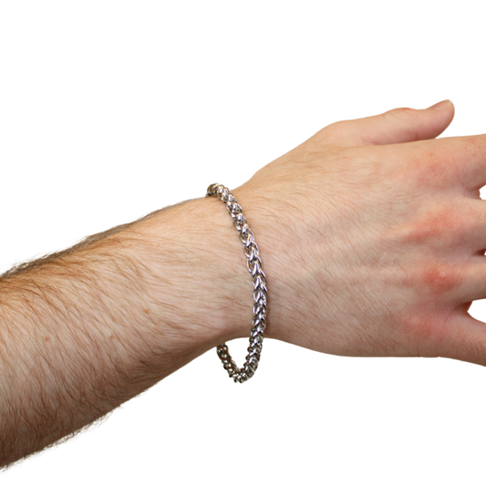 silver chain bracelet on hand model
