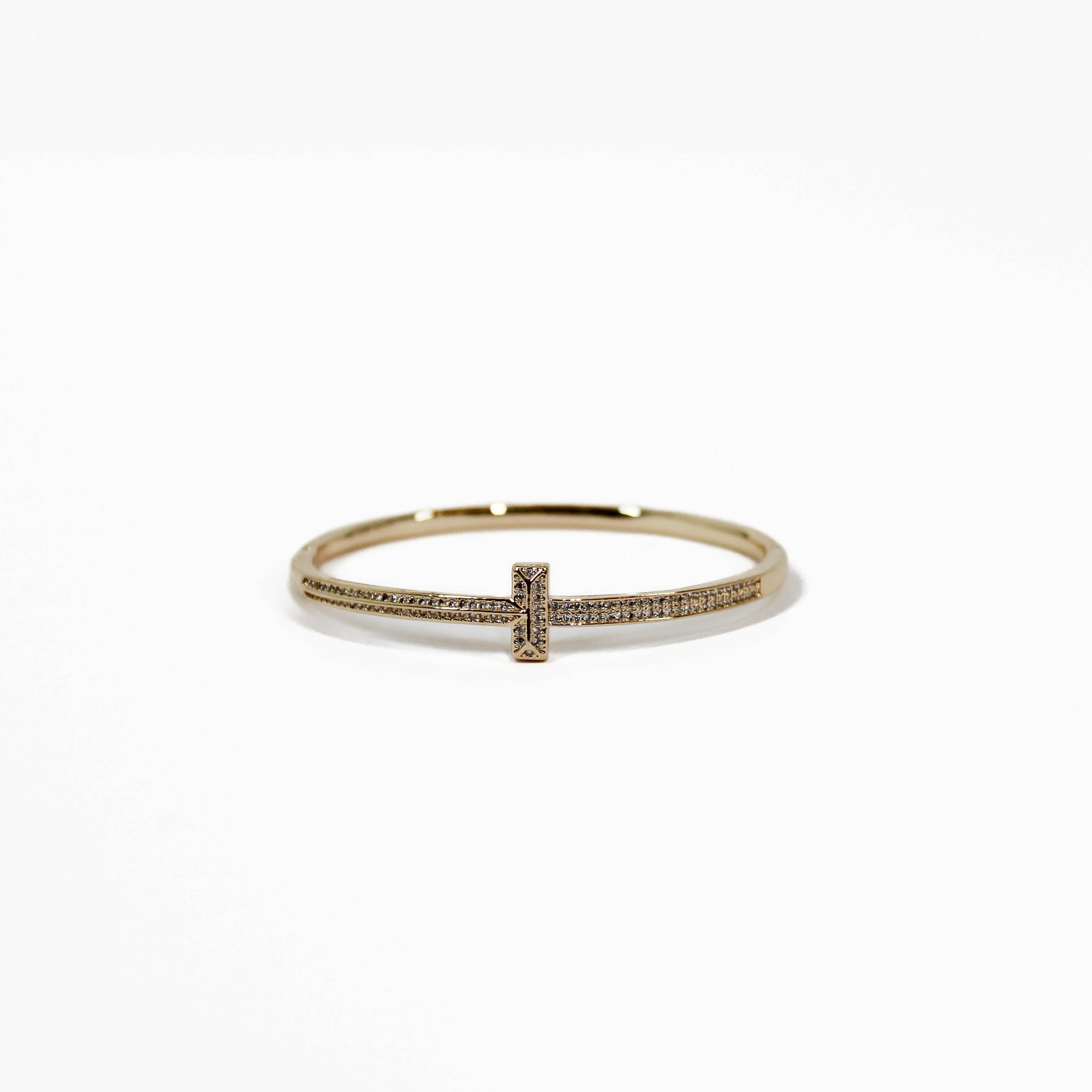 Gold T-Bar Hinged bangle bracelet on a white background