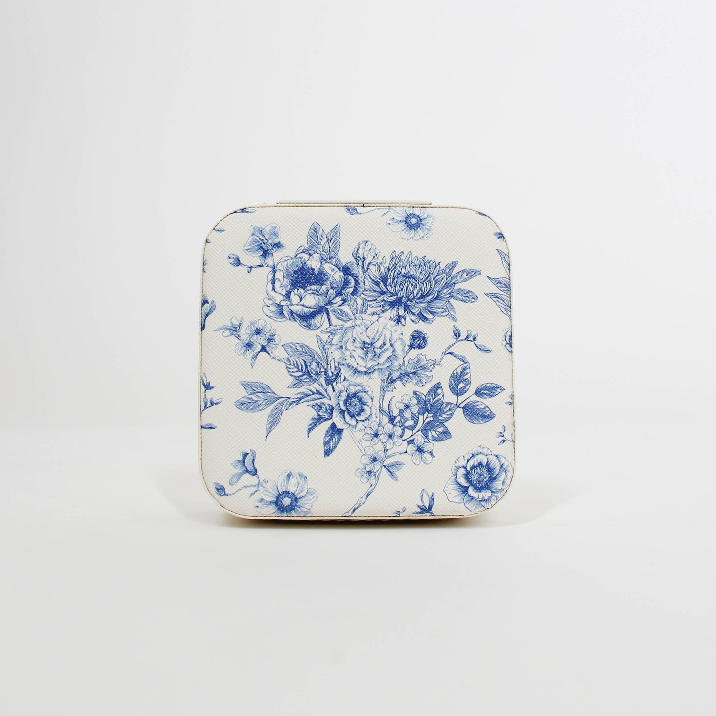 travel jewelry organizer with blue floral pattern on a white background
