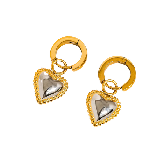 Gold and silver heart-shaped earrings on a white background
