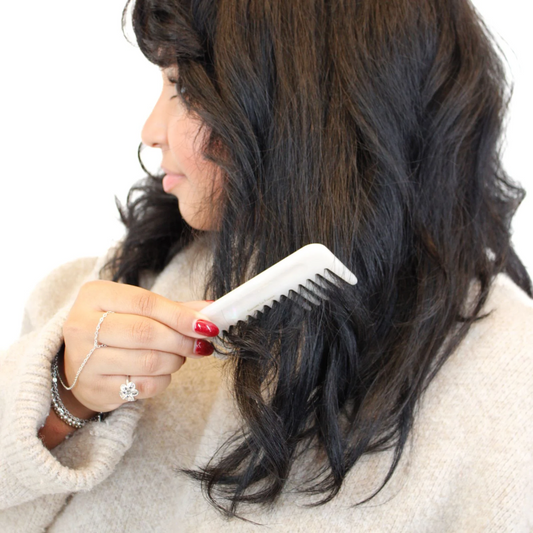 Using Wide Tooth Hair Comb