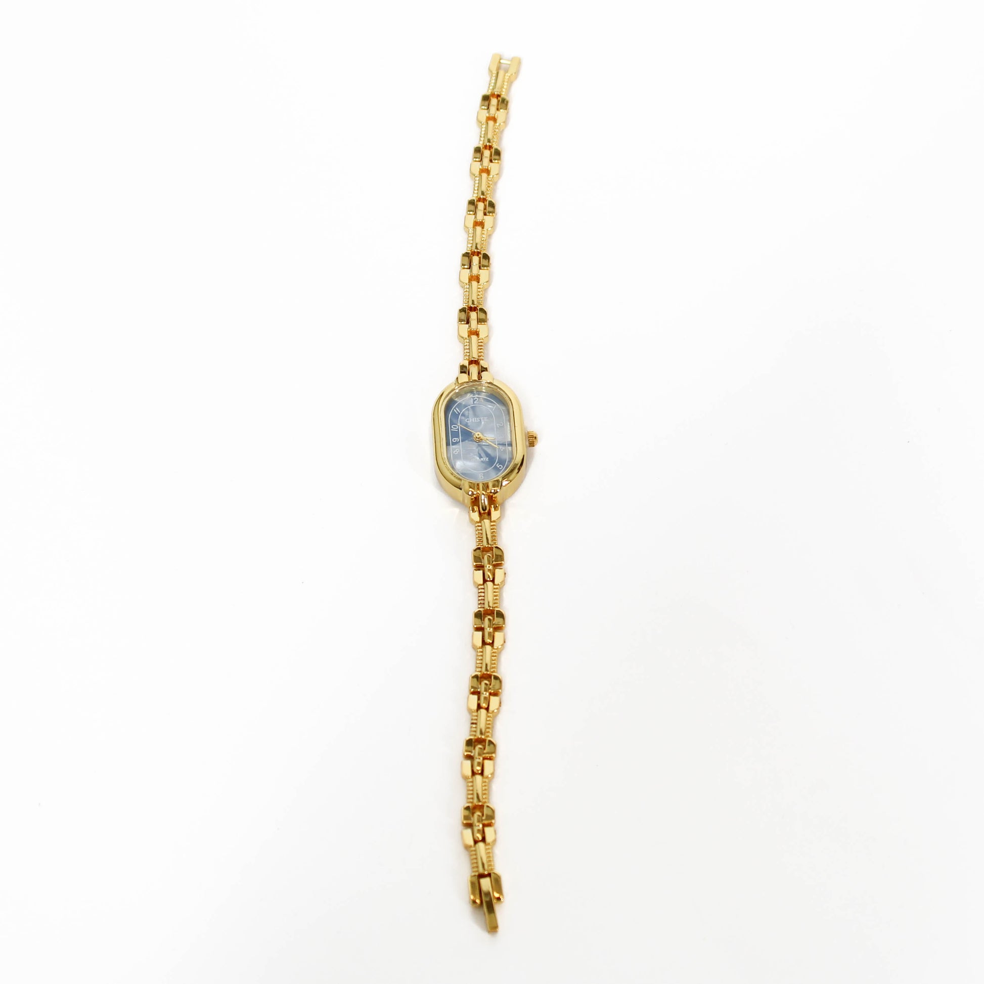 Gold vintage oval watch bracelet with a blue face on a white background