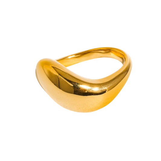 close up of gold Wavy Band Ring on white background