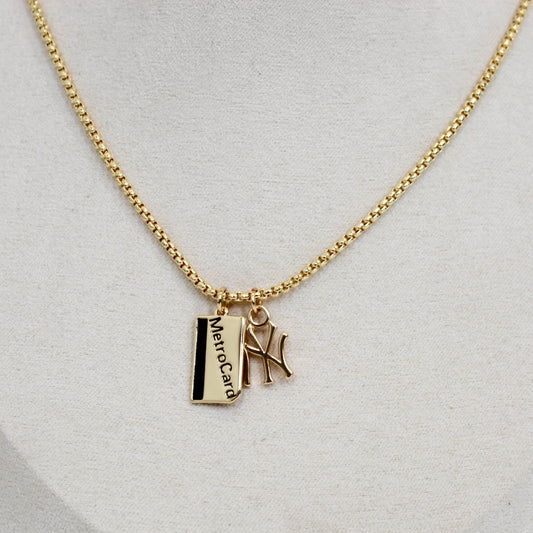 Gold yankee charm pendant necklace with metro card charms
