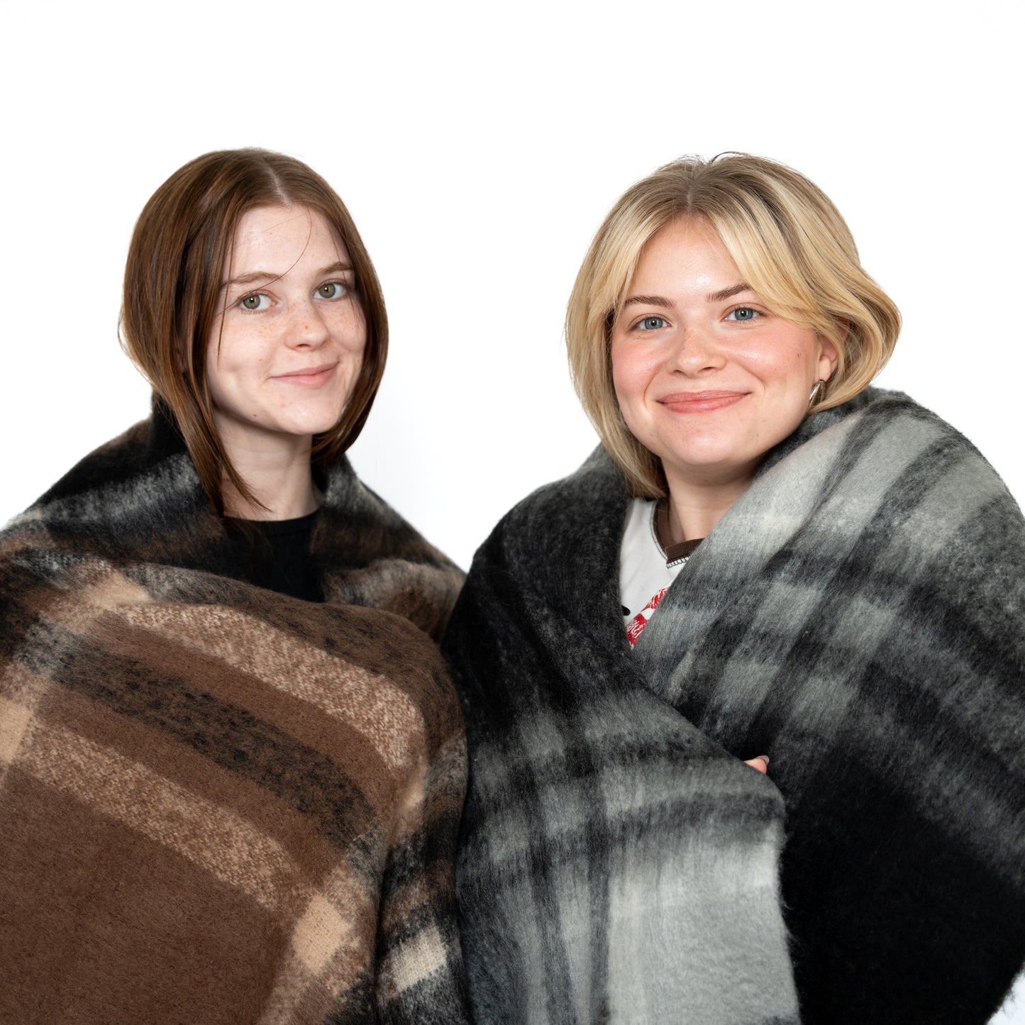 brown plaid scarf and black plaid scarf